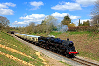 Standard class 4 4-6-0 no. 75014 'Braveheart' on three-month visit Dartmouth Steam Railway is seen at Greet heading towards  Winchcombe Station on 8.4.23 with 1245 Cheltenham to Broadway GWSR service