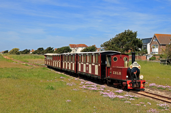 The Hayling Light Railway is a 2ft narrow gauge line that runs along the south coast of Hayling Island between Eastoke Corner and Beachlands. On 28.5.23 No 3 'Jack' approaches Mengham Road with 1105 o