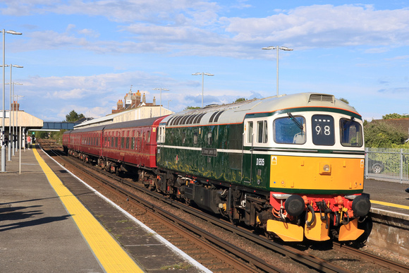 D6515 'Lt Jenny Lewis RN' (33012) with GBRf's London Underground 4TC set waits at Wareham Station on 11.5.23 with 5Z34 1112 Eastleigh to Swanage ECS train for the Swanage Railway Diesel Gala May 2023