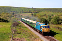 Class 33 No 33111 with D8532 at rear seen from Townsend Bridge, Corfe Castle on 13.5.23 with 1R13 1532 River Frome Viaduct to Swanage service at the Swanage Railway Diesel Gala May 2023