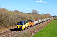 Colas Rail Class 70 No 70810 passes Barrow upon Trent heading towards Stenson Junction on 3.4.23 wirh 4Z33 1430 Mountsorrel Tarmac Colas to Penmaenmawr Quarry Gbrf empty box wagons