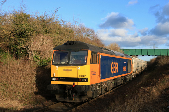 GBRf Class 60 No 60087 Ingleborough seen at Brockley Whins on the Tyne Dock freight only line on 25.1.25 with 6N22 1351 Tyne Coal Terminal Gbrf to Lynemouth Power Stn (Gbrf) loaded Biomass hoppers