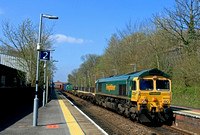 Freightliner Class 66 No 66505 rattles through Overton Station, Hampshire on 18.4.23 with 4M58 0927 Southampton M.C.T. to Garston F.L.T. via Andover  Intermodal