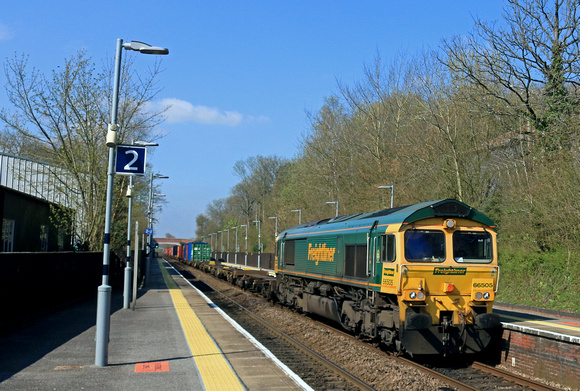 Freightliner Class 66 No 66505 rattles through Overton Station, Hampshire on 18.4.23 with 4M58 0927 Southampton M.C.T. to Garston F.L.T. via Andover  Intermodal