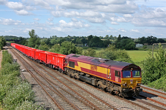 DB Cargo 66099 crosses from fast to slowline at Trowell Junction on the Erewash Valley Line on 5.7.16 with 6Z69 1350 Heck Plasmor P S - Dowlow Briggs Sdgs via Toton North Yard empty red new MMA wagons
