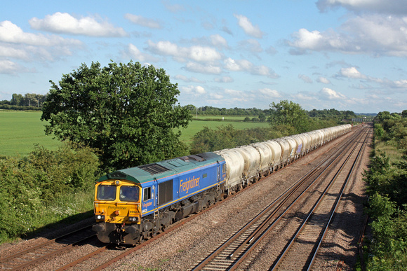 Freightliner 66623 'Bill Bolsover' in blue livery passes Cossington, MML heading towards Sileby Junction on 20.6.16 with 6M92  1223 West Thurrock Sidings Fhh -Tunstead Sdgs empty cement tanks