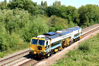 DR 75404 is a Matisa B41UE Tamper. It is owned by VolkerRail. On 7.7.23 it passes Syston, Leics with 6J15 0859 Knighton Junction Sidings to Knighton Junction Sidings working