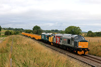 Europhoenix 37901 'Mirrlees Pioneer' & 37418 shatter the peace at Copley's Brook, Melton Mowbray on 28.7.23 with 6Z37 0701 Derby R.T.C.(Network Rail) to Whitemoor Yard L.D.C Gbrf converted new JNA-Y b