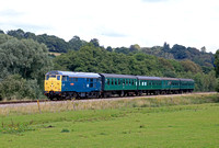 Class 31 No 31430 'Sister Dora' approaches Pokehill Crossing on 4.8.23 with 1315 Tunbridge Wells West to Eridge service at the Spa Valley Railway summer Diesel Gala 2023