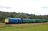 Class 31 No 31430 'Sister Dora' slowly approaches Pokehill Crossing on 4.8.23 with 1315 Tunbridge Wells West to Eridge service at the Spa Valley Railway summer Diesel Gala 2023