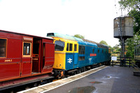 Slim Jim Class 33 No 33202 ' Dennis G Robinson'  with restored brake van 3062 stands at Tenterden Town Station on 5.8.23 having arrived with 0950 Northiam to Tenterden service on the Kent and East Sus