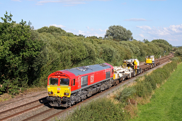 DB Cargo 66085 in DB Schenker red livery passes Barrow upon Trent heading towards Stenson Junction on 4.8.17 with 6G45 1653 Toton North Yard - Bescot Up Engineers Sdgs departmental