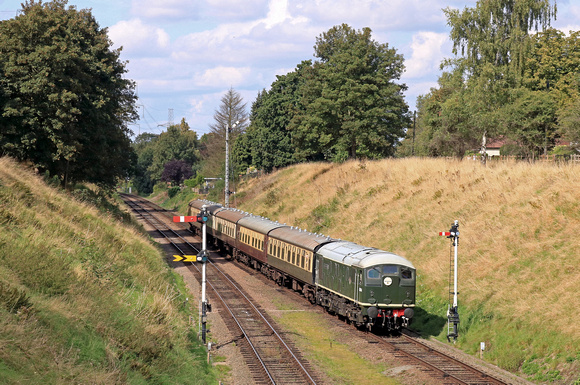 Guest loco Class 24 No D5054 'Phil Southern' from East Lancashire Railway passes between the signals at Rothley on 2.9.23 with 1400 Loughborough - Leicester North service at GCR Diesel Gala September