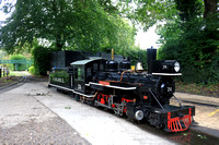 No 24  ‘Lord Braybrooke a 2-6-2 steam engine based on a Sandy River & Rangely Lakes Railroad stands outside the maintenance building at Audley End Miniature Railway 10 ¼ inch guage