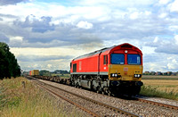 DB Class 66 No 66017 in red livery  at Eastrea near Whittlesea on 22.9.23 with 4L45 1004 Wakefield Europort to Felixstowe South Dbc Intermodal