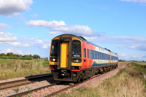 EMR Class 158 No 158812  at Eastrea near Whittlesea on 22.9.23 with 1R76 1354 Norwich to Liverpool Lime Street service