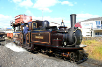 Double Fairlie 'James Spooner'  takes on water and coal at Porthmadog coal yard on 12.6.24 before taking a rake of stock to  Boston Lodge Workshops, Ffestiniog & Welsh Highland Railways for stabling