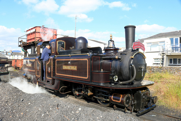 Double Fairlie 'James Spooner'  takes on water and coal at Porthmadog coal yard on 12.6.24 before taking a rake of stock to  Boston Lodge Workshops, Ffestiniog & Welsh Highland Railways for stabling