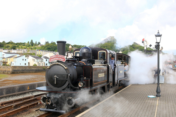 Getting all steamed up Double Fairlie 'James Spooner'  departs Porthmadog station, Ffestiniog and Welsh Highland Railways on 14.6.24 with 1040  'Mountain Spirit' service to Bl. Ffestiniog