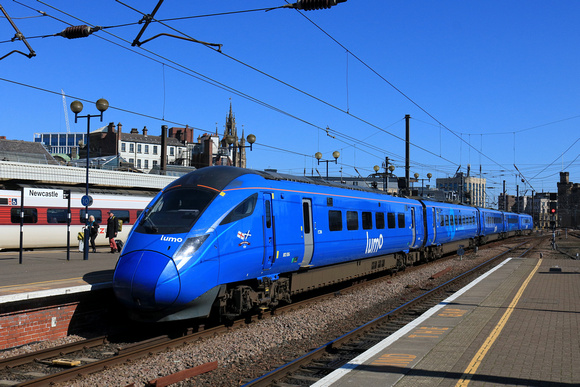 Lumo Class 803 No 803004 branded Whiskey Express, a new partnership with Holyrood Distillery, arrives at Newcastle station on 7.4.25 with 1E84 1124 Edinburgh to London Kings Cross service