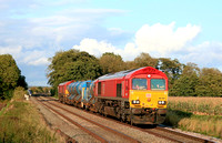 DB Cargo Class 66 No's 66070 and 66185 both in red livery tnt seen at East Goscote on 3.10.23 with 3J43 1600 Peterborough L.I.P. to Peterborough L.I.P. RHTT working via Melton Mowbray and Loughborough