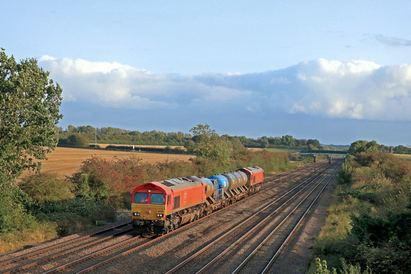 DB Cargo Class 66 No's 66070 and 66185 both in red livery tnt seen at Cossington, MML on 3.10.23 with 3J43 1600 Peterborough L.I.P. to Peterborough L.I.P. RHTT working via Melton Mowbray and Loughboro