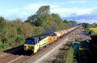 Colas Rail Class 70 No 70808 powers away from Stenson Junction on 3.10.23 with 6M57 0702 Lindsey Oil Refinery Colas to Kingsbury Oil Sdgs loaded oil tanks