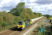 Freightliner Class 70 No 70016 powers away from Stenson Junction on 3.10.23 with 6G65 0919 Hope (Earles Sidings) Fhh to Walsall Freight Terminal loaded cement tanks