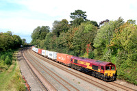 DB Cargo 66194 in old EWS livery passes Barrow upon Soar, MML on 6.10.23 with 4L38 1055 East Mids Gateway Tml Dbc to Felixstowe Central Dbc Intermodal