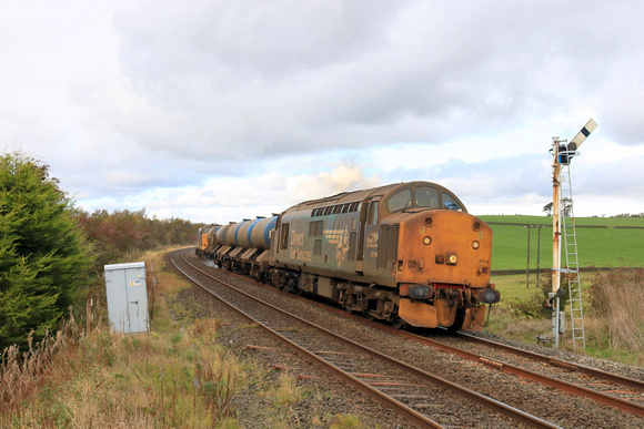 37716 is seen approaching Haw Lane Crossing, Hellifield along with 37425 at the rear working 3S29 0827 York Thrall Europa to York Thrall Europa  RHTT on 22 October 2023