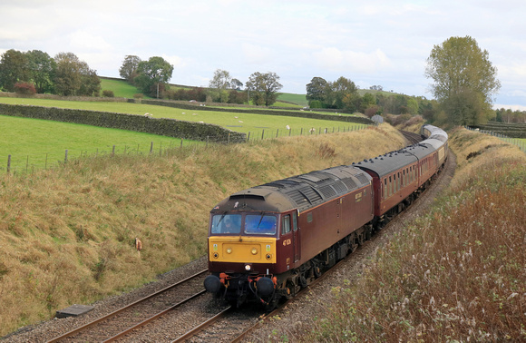 47826 is seen approaching Long Preston along with 47815 at the rear on 22.10.23 working 5Z55 1222 Barnetby Down Recp Gbrf to Carnforth Steamtown ECS move