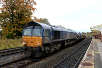 DRS Class 66 No 66429 waits at Hellifield Goods Loop on 29.10.23 with 3S29 0827 York Thrall Europa to York Thrall Europa RHTT working via Hellifield. Class 66 No 66425 'Nigel J Kirchstein'  is at the