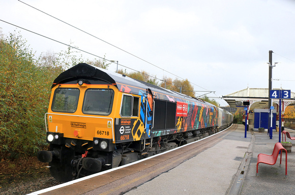 GBRf Class 66 No 66718 repainted & renamed 'Peter, Lord Hendy of Richmond Hill, of Imber in the County of Wiltshire' at Skipton station on 2.11.23 with 6D37 1220 Rylstone Tilcon (Gbrf) to Hunslet Tilc