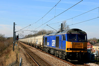 Beacon Rail blue liveried GBRf Class 60 No 60026 Helvellyn about to enter Tyne & Wear Metro Fellgate station on 20.3.25 with 6N19 0959 Lynemouth Power Stn (Gbrf) to Tyne Coal Terminal Gbrf empty Bioma