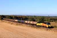 Colas Rail Freight Class 70 No 70813 passes Plawsworth near Durham, ECML on 18.9.24 with 6D43 1541 Jarrow Prax to Lindsey Oil Refinery Colas empty bogie tanks