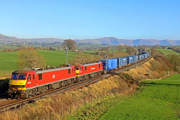 DB Cargo 90040 & 90018 'Pride of Belshill' double head 4M25 0606 Mossend Euroterminal to Daventry Int Rft Recep Rfd at Docker on 17.11.18 with a well loaded Intermodal