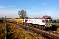 New London Underground Map livery 66721 'Harry Beck' at Copleys Brook, Melton Mowbray on 13.11.13 with 6L76 Cliffe Hill Stud Farm Quarry - Whitemoor Yard loaded yellow IOA wagons looking stunning