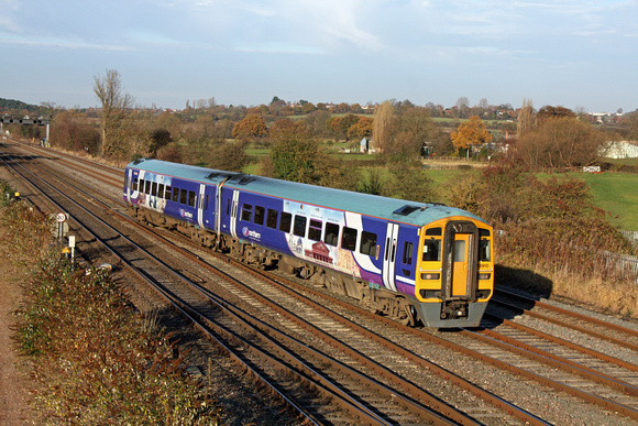 Northern  Class 158 unit No 158910 crosses over at Trowell Junction  on 27.11.13 with 1Y29 1205 Leeds -  Nottingham service