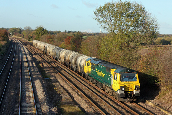 70004 at Normanton on Soar, MML heading towards Loughborough on 14.11.13 with 6L87 1237  Earles Sidings - West Thurrock loaded small PCA cement tanks
