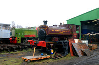 Andrew Barclay No 10 'Forth' seen in Kirkland Yard, Fife Heritage railway, Leven on 9.12.23 in light steam outside the Munro Workshop
