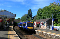 Scotrail Class 170 No 170403 passes through the award-winning Aberdour station, Fife on 11.8.24 with 2L57 1132 Edinburgh to Dundee service
