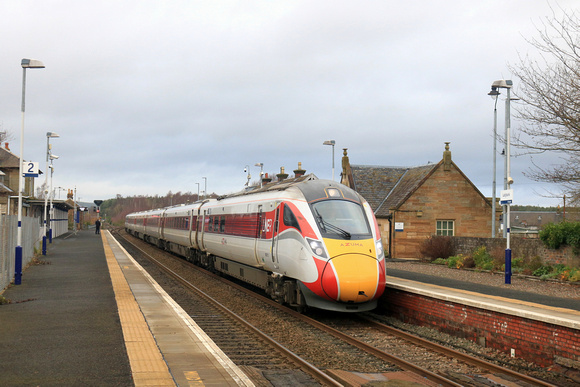 LNER Azuma Class 800 No 800112 working under diesel power passes through Ladybank station, Fife on 16.12.23 with 1E15 0952 Aberdeen to London Kings Cross service