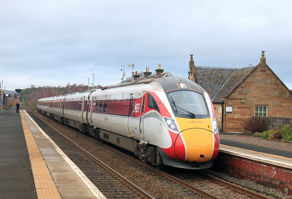 LNER Azuma Class 800 No 800112 working under diesel power races through Ladybank station, Fife on 16.12.23 with 1E15 0952 Aberdeen to London Kings Cross service