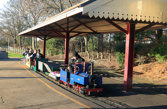 Downs Light Railway 'Brock' at Lakeshore Railroad Miniature Railway, South Shields with a festive train on 24.12.23 ready for another circuit of the lake