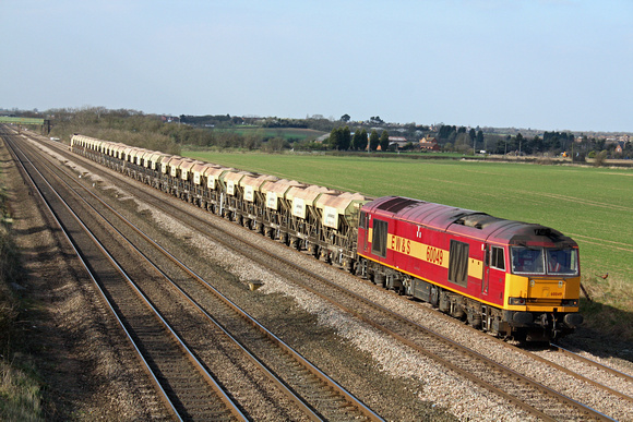 60049 at Cossington, MML heading for Syston East Junction on 23.3.11 with 6E63 1448 Mountsorrel - Peterborough loaded La Farge self discharge hoppers. Note the male Pheasant  in field alongside