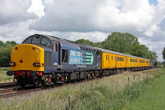 37059 tnt 37069 at East Goscote heading towards Syston East Junction on 18.6.11 with 1Q13 0728 Ipswich - Derby RTC Network Rail Serco working