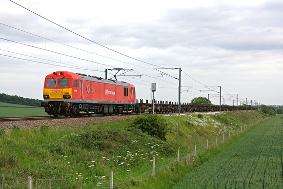 92009 recently repainted in DB Schenker livery is seen at Frinckley Lane, Marston north of Grantham, ECML on 1.6.11 with 4E32 1152 Dollands Moor - Scunthorpe  empty steel carriers