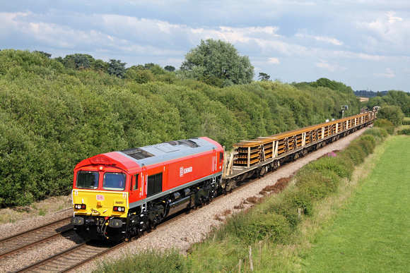 66097 newly repainted in DB Schenker livery at Toton and released today seen at Barrow Upon Trent heading towards Stenson Junction on 29.6.11 with 6G45 1642 Toton  - Bescot departmental