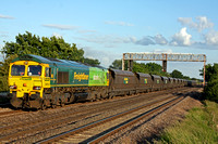 66522 Freightliner and Shanks livery at Cossington  MML heading north towards Sileby Junction on  7.6.11 with 6A05 1815 Daw Mill - Ratcliffe Power Station loaded FHH coal hoppers  in lovely evening su