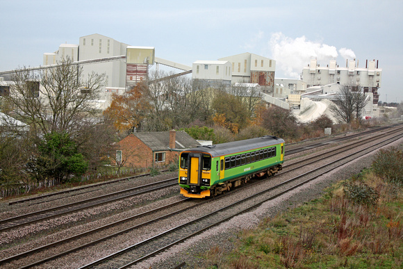 EMT Class 153 no 153376 still in old Central Trains green livery passes Singletons' Birch Lime Works near Melton Ross on 23.11.11 with 1128 Grimsby - Newark North Gate service